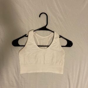 It is a white sport bra size small